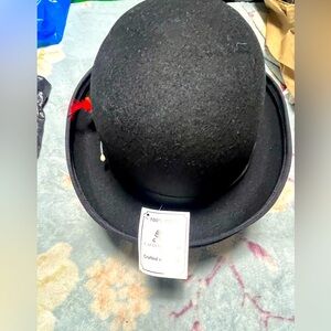 CAPAS headwear derby hat.